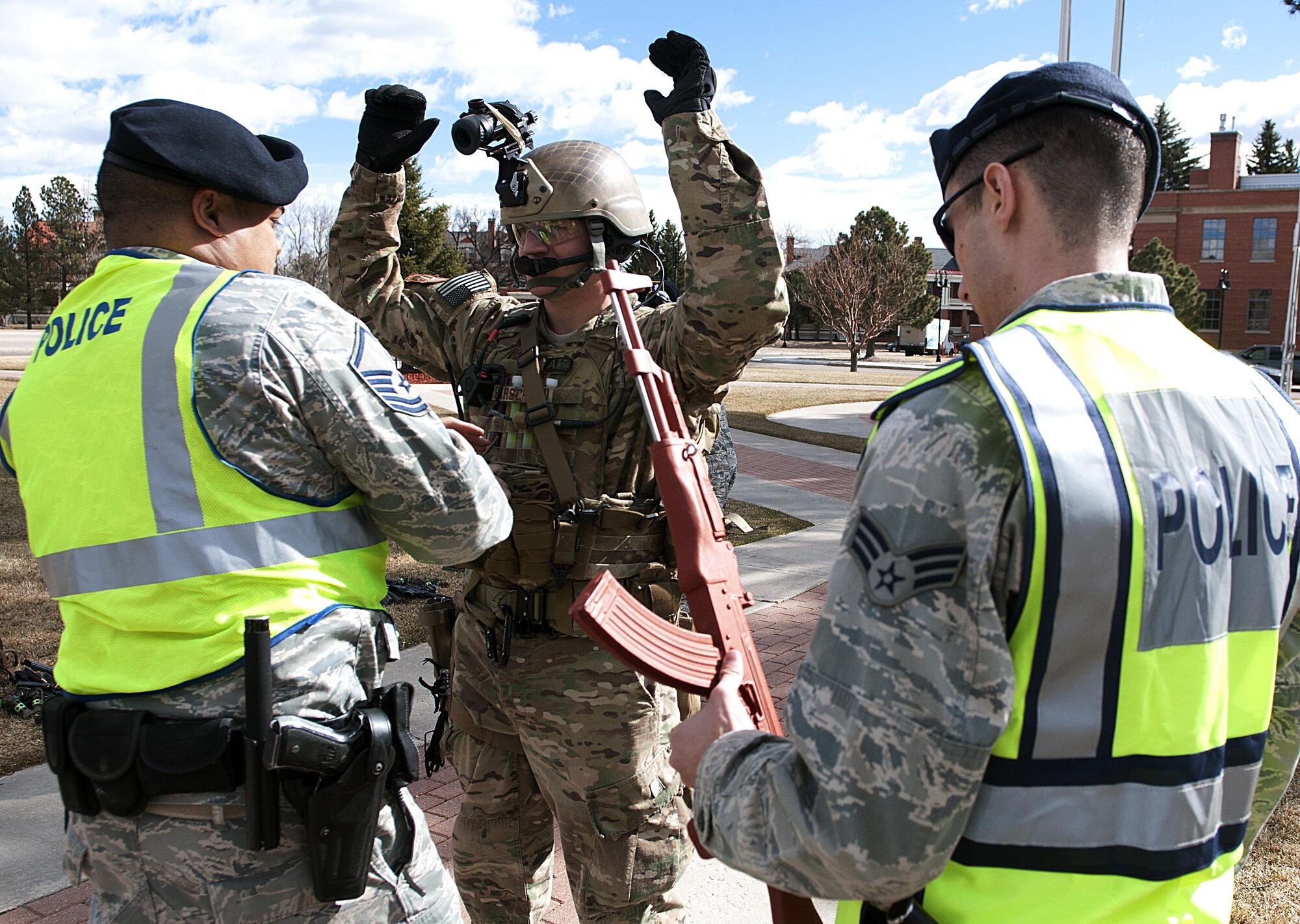 Master Sgt. Paul Eversley, 90th Security Forces Squadron Plans and Programs superintendent, verifies that there is no live ammunition on Airman 1st Class Donovan Hirschfeld, 790th Missile Security Forces Squadron Tactical Response Force member, Feb. 29, 2016, to ensure the safety of all participants during an active shooter exercise at the base theater on F.E. Warren Air Force Base, Wyo. (U.S. Air Force photo by Airman 1st Class Malcolm Mayfield)