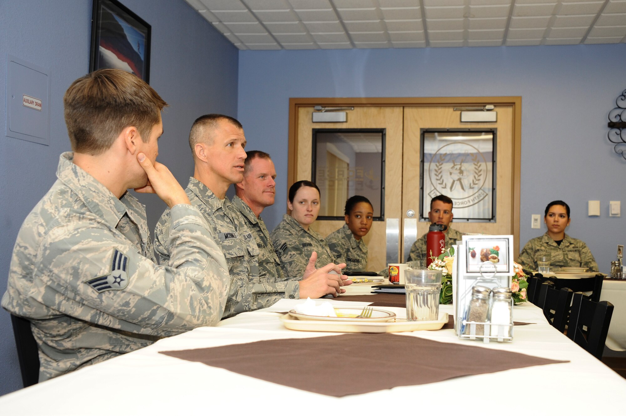 U.S. Air Force Chief Master Sergeant Steve McDonald, Air Combat Command command chief, speaks to Desert Lightning Team Airmen during breakfast at the Desert Inn Dining facility at Davis-Monthan Air Force Base, Ariz., March 4, 2016. McDonald is the enlisted advisor to the commander and staff for the enlisted force stationed at 34 wings, 19 bases and at more than 70 operating locations around the world. (U.S. Air Force photo by Airman 1st Class Mya M. Crosby/ Released)