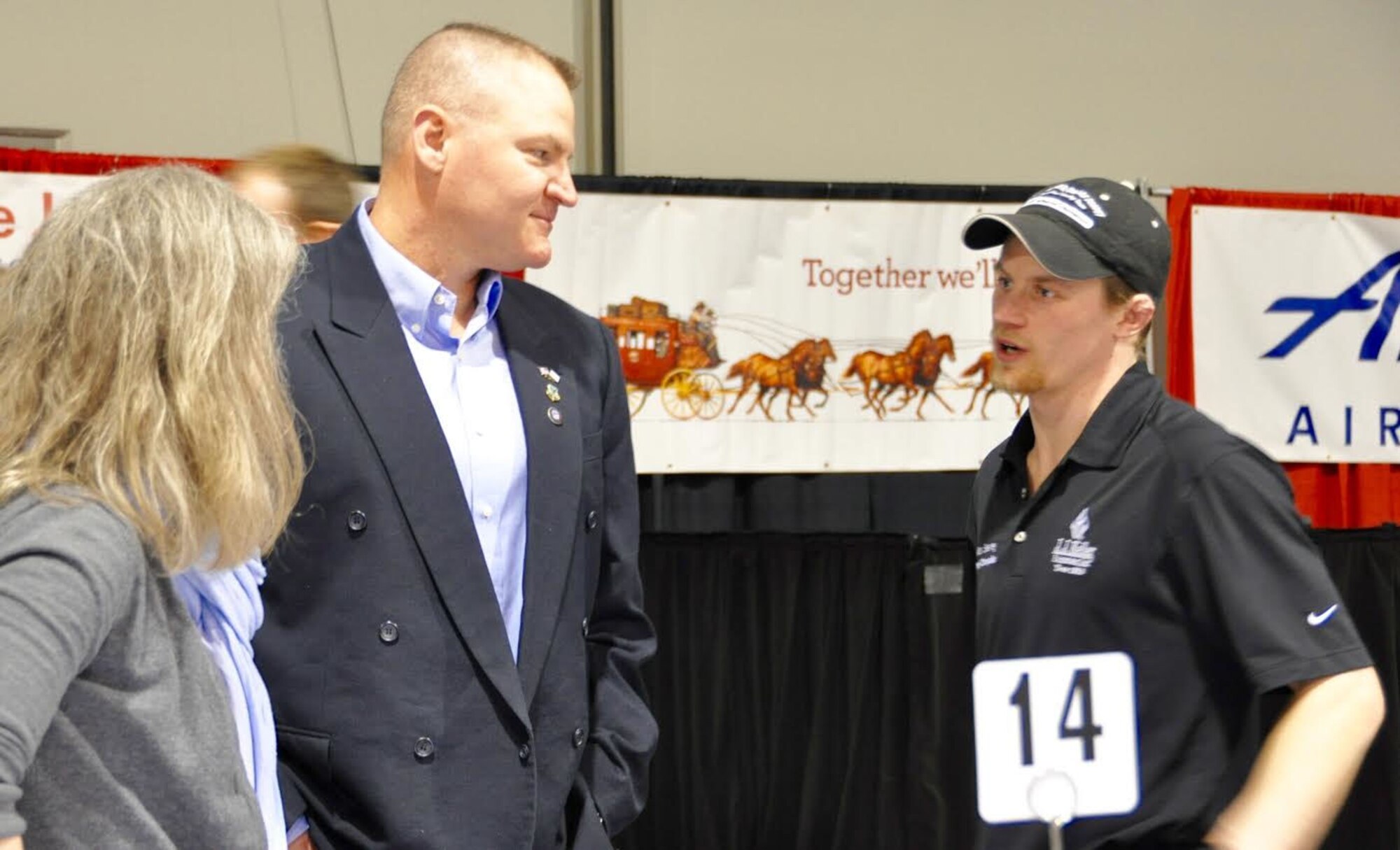 Col. Chris Ogren, 477th Fighter Group deputy commander and his wife, Amy Ogren, speak with Dallas Seavey, three-time Iditarod champion, during the Mushers’ Banquet in Anchorage, Alaska, March 3, 2016. Seavey visited with Reservists and toured an F-22 at Joint Base Elmendorf-Richardson, Alaska, March 2. The Iditarod is a 1,000-mile sled dog race across the rugged terrain of Alaska. This is the second year Air Force Reserve Recruiting has sponsored the Iditarod, which is known as “The Last Great Race on Earth.” (U.S. Air Force/Tech. Sgt. Kimberly Moore) 