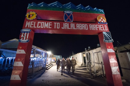 Marine Corps Gen. Joseph F. Dunford Jr., chairman of the Joint Chiefs of Staff, left, and Army Brig. Gen. Michael Howard walk to the flightline on Forward Operating Base Fenty in Jalalabad, Afghanistan, March 2, 2016. DoD photo by D. Myles Cullen