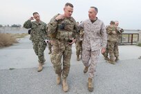 Marine Corps Gen. Joseph F. Dunford Jr., chairman of the Joint Chiefs of Staff, left, and Army Brig. Gen. Michael Howard arrive at Forward Operating Base Fenty in Jalalabad, Afghanistan, March 2, 2016. DoD photo by D. Myles Cullen