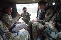 Marine Corps Gen. Joseph F. Dunford Jr., chairman of the Joint Chiefs of Staff, left, gives a thumbs-up to the crew of a UH-60 Black Hawk helicopter before taking off from Kabul, Afghanistan, March 2, 2016. DoD photo by D. Myles Cullen