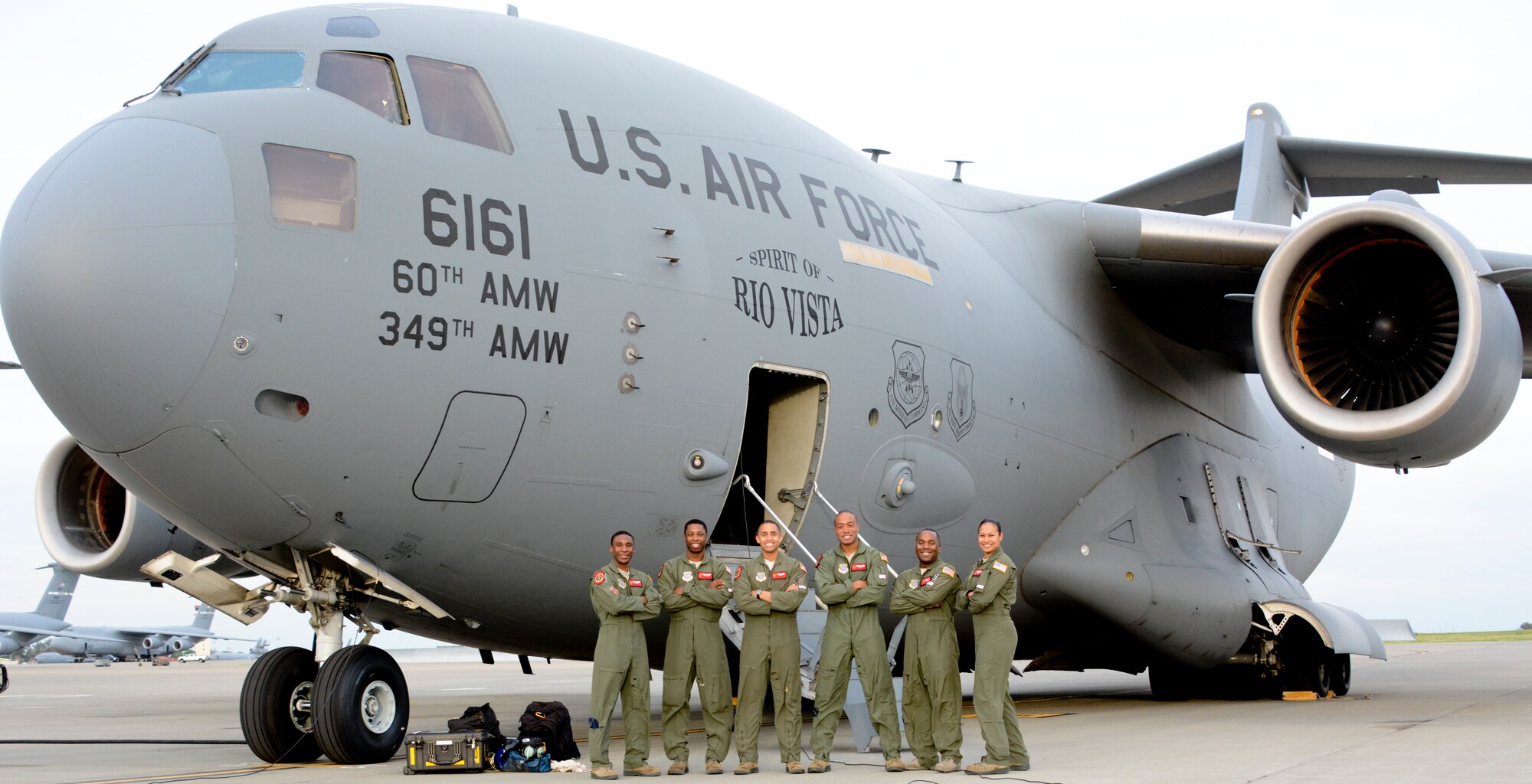 In honor of African American History Month and the Tuskegee Airmen, a crew of six Airmen from the 21st Airlift Squadron organized an all African-American crew March 2 for a night training mission. From left to right, Capt. Broderick Lockett, pilot; Senior Airman Charles Palmer, loadmaster; Capt. Dante Earle, pilot; Capt. Saj El-Amin, pilot; Master Sgt. Ronald Strayhorne, loadmaster; and Master Sgt. Shevaun Reighter, instructor loadmaster. 