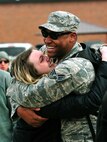A member the 5th Bomb Wing returns from deployment at Minot Air Force Base, N.D., March 4, 2016. Approximately 275 Airmen and four B-52H Stratofortresses returned after a six month deployment to Andersen Air Force Base, Guam. (U.S. Air Force photo by Staff Sgt. Chad Trujillo)