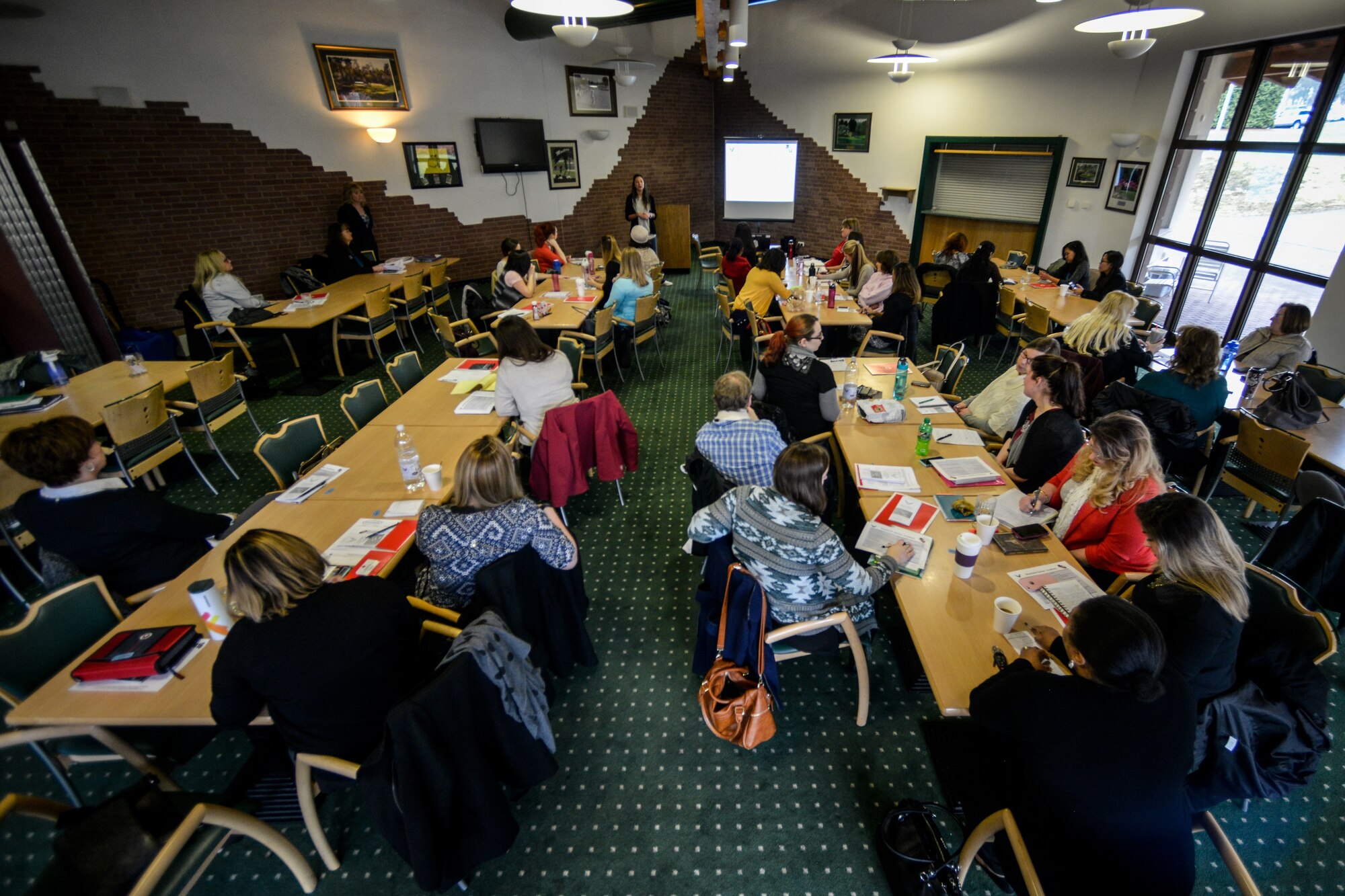 Spouses gather for the first ever Ramstein Spouse Academy March 4, 2016, at Ramstein Air Base, Germany.  In an attempt to ease the stress of many challenges of transitioning into a military lifestyle, the 86th Airlift Wing hosted the event which was comprised of 13 briefings on various topics. (U.S. Air Force photo/Senior Airman Nicole Sikorski)