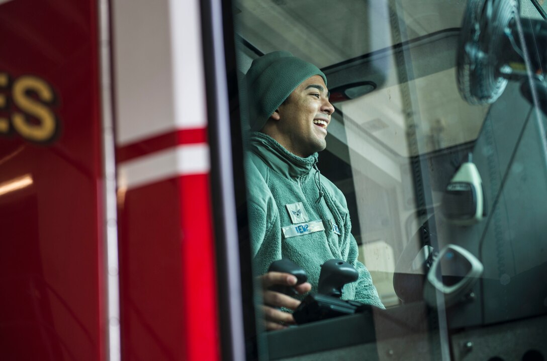 Senior Airman Derrick Kemp, 424th Air Base Squadron firefighter, conducts an operations check on a crash truck at Chièvres Air Base, Belgium, Feb. 25, 2016. Kemp is one of 70 Airmen stationed at the ABS that provides airfield operations support for the base. (U.S. Air Force photo/Staff Sgt. Sara Keller)