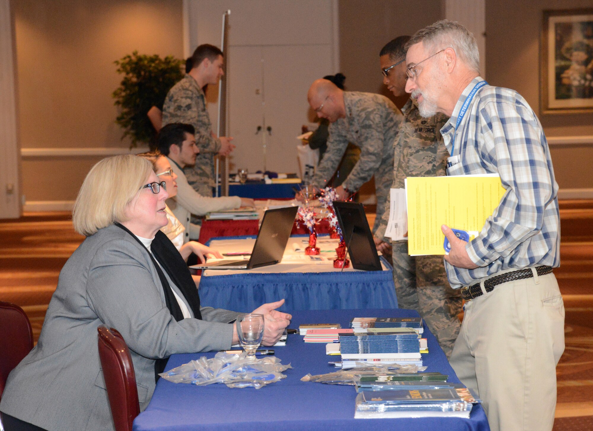 Vendors set up informational booths at a financial fair held at the Tinker Club Feb. 24. The fair is hosted annually by the Airman and Family Readiness Center during Military Saves Week. (Air Force photo by Kelly White)