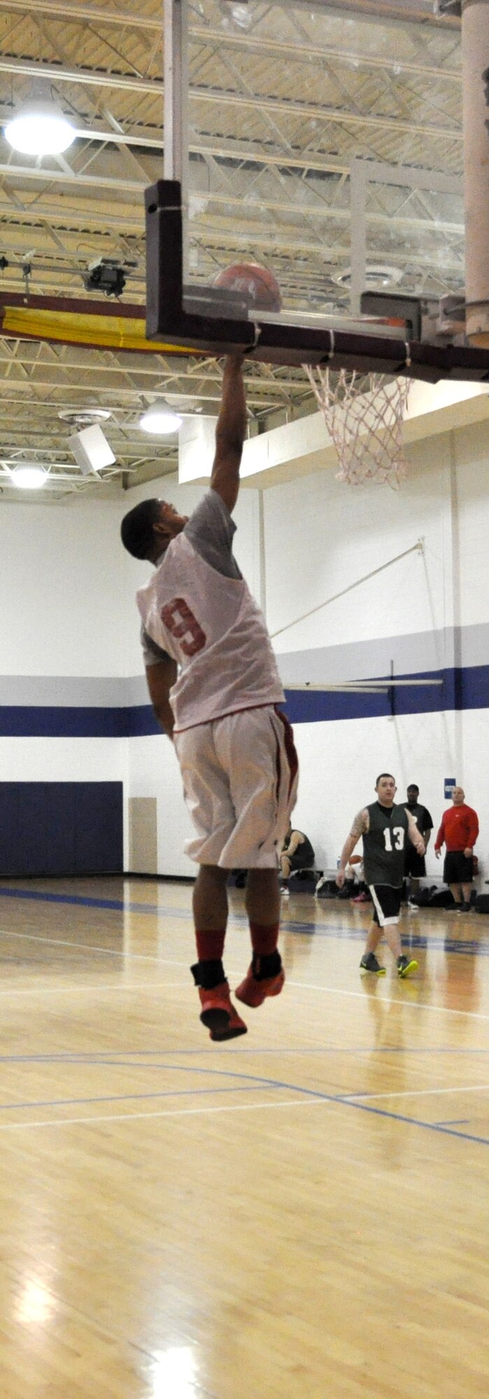 Ryan Rutledge of Flight Controllers flies high to the hoop in the Feb. 24 matchup against 552 MXS. The Controllers grabbed the win by a 13-point margin. 