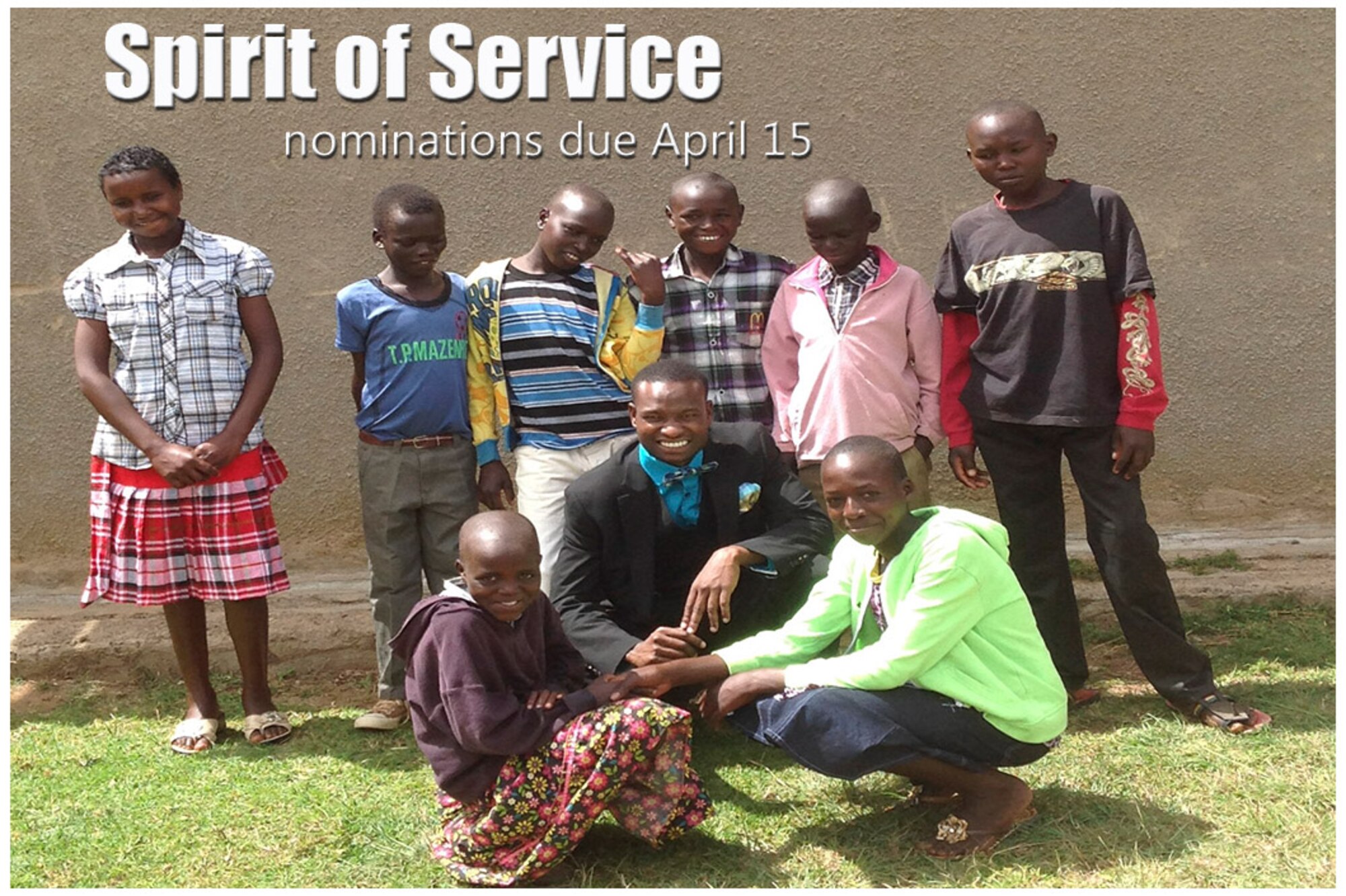Staff Sgt. Dominic Kosgel (center with bow tie) stands with a group of orphaned children in his homeland of Kenya. Kosgel, NCO in charge of traffic management for the 377th Logistics Readiness Squadron at Kirtland Air Force Base, New Mexico, was the recipient of the 2015 American Legion Spirit of Service Award. Kosgel visits Kenya every year to help at the orphanage. Junior enlisted members who commit themselves to helping others by volunteering in their communities are eligible for the American Legion Spirit of Service Award. Nominations for the 2016 American Legion Spirit of Service Award are due to the Air Force Personnel Center by April 15. (Courtesy photo)
