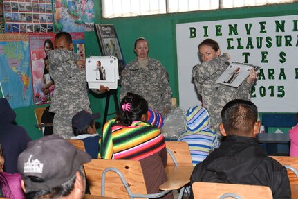 LA PAZ, Honduras – U.S. Army Sgt. Jason Nisperos and Sgt. Lisa Kent, Joint Task Force-Bravo Medical Element Preventive Medicine, instruct Honduran patients about the necessary precautions for disease prevention, prior to their medical consultations with U.S. and Honduran medical providers, during a Medical Readiness Training Exercise in La Paz Department, Honduras, March 2, 2016. This medical exercises was an opportunity for more than 600 Hondurans to receive healthcare from Honduran health organizations and U.S. Servicemembers working together in the area. (U.S. Army photo by Martin Chahin/Released)