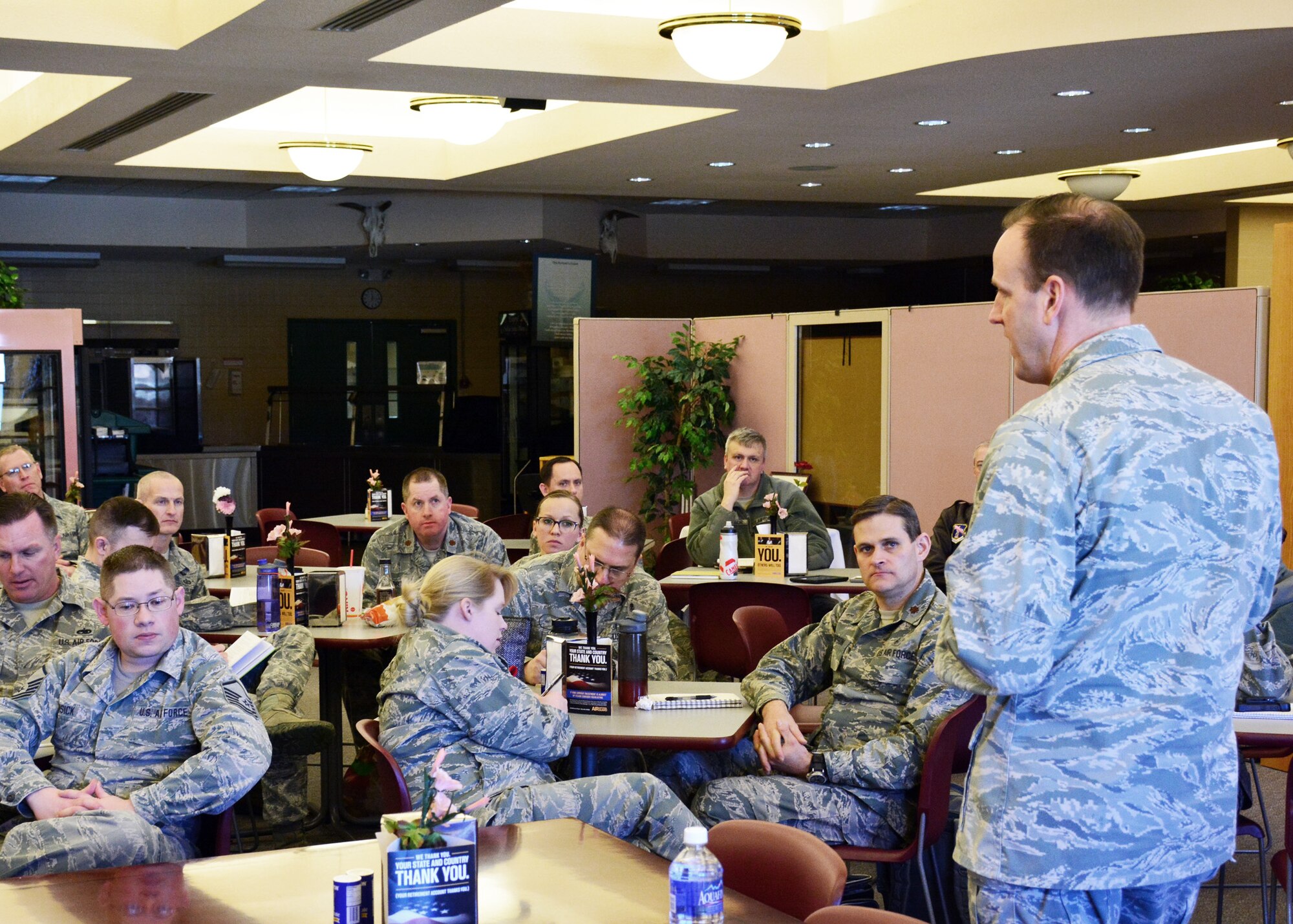 120th Airlift Wing Commander Col. Lee Smith discusses Enlisted Performance Report stratification with Airmen during a brown bag lunch held in the wing dining facility Feb. 24, 2016. Col. Smith plans to have a brown bag lunch event held on base at least once a month. (U.S. Air National Guard photo by Senior Master Sgt. Eric Peterson)