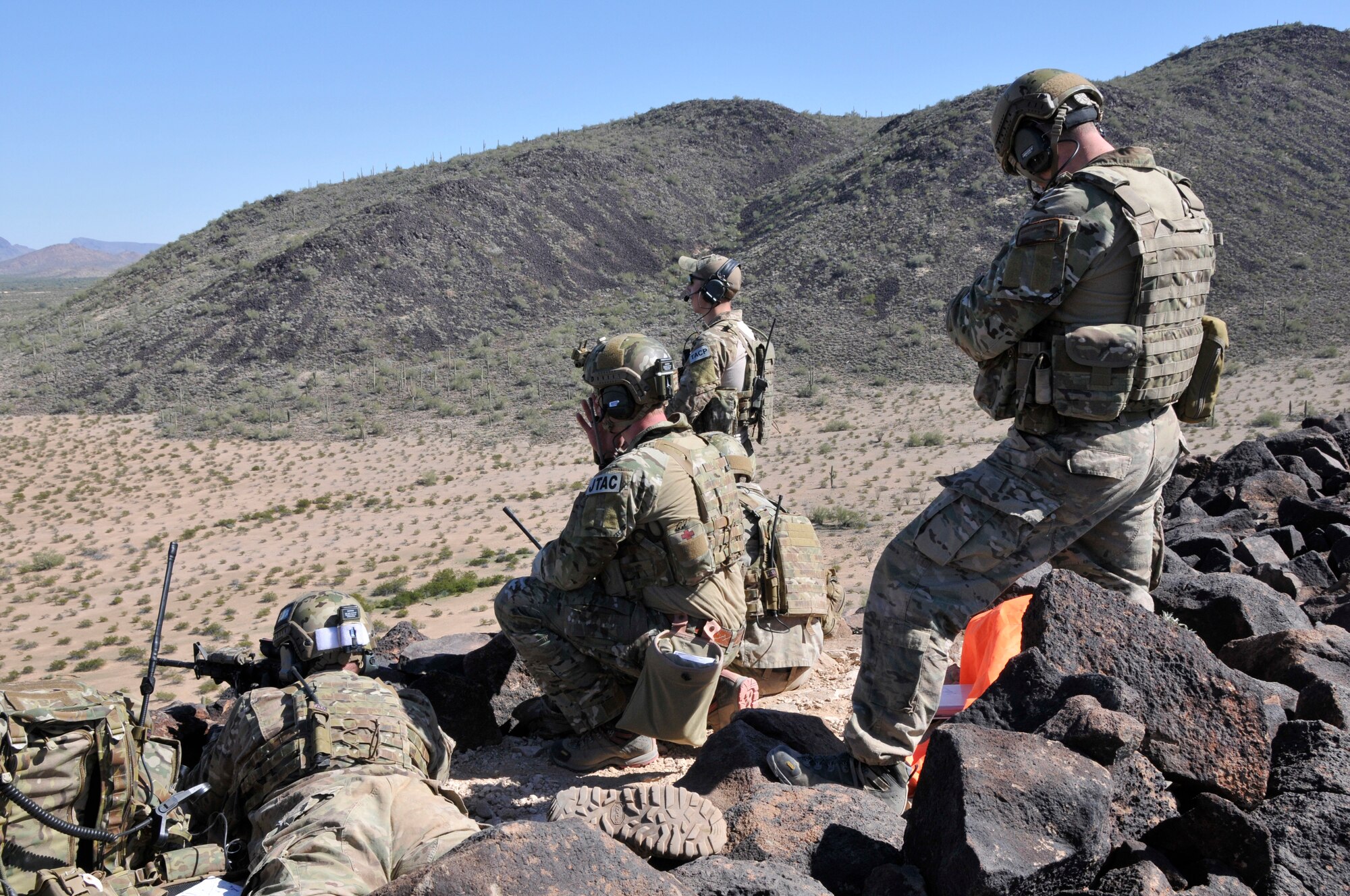 U.S. Air Force Tactical Air Control Party Airmen with the 181st Intelligence Wing, 113th Air Support Operations Squadron conduct Close Air Support operations on the observation post while working with F-16 Fighting Falcon aircraft while at Gila Bend Air Force Auxiliary Field, Ariz. (U.S. Air National Guard photo by Senior Master Sgt. John S. Chapman)