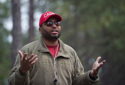 Master Sgt. Areis Early, 1st Combat Camera Squadron video standards and evaluations section chief, instructs combat camera Airmen March 3, 2016, during exercise Scorpion Lens 2016, at McCrady Training Center, Fort Jackson, South Carolina. The exercise is an annual training requirement incorporating combat camera job qualification standards and advanced weapons and tactical training with Army instructors. (U.S. Air Force photo/Staff Sgt. Jared Trimarchi)
