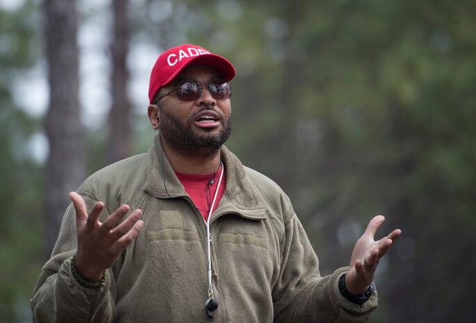 Master Sgt. Areis Early, 1st Combat Camera Squadron video standards and evaluations section chief, instructs combat camera Airmen March 3, 2016, during exercise Scorpion Lens 2016, at McCrady Training Center, Fort Jackson, South Carolina. The exercise is an annual training requirement incorporating combat camera job qualification standards and advanced weapons and tactical training with Army instructors. (U.S. Air Force photo/Staff Sgt. Jared Trimarchi)
