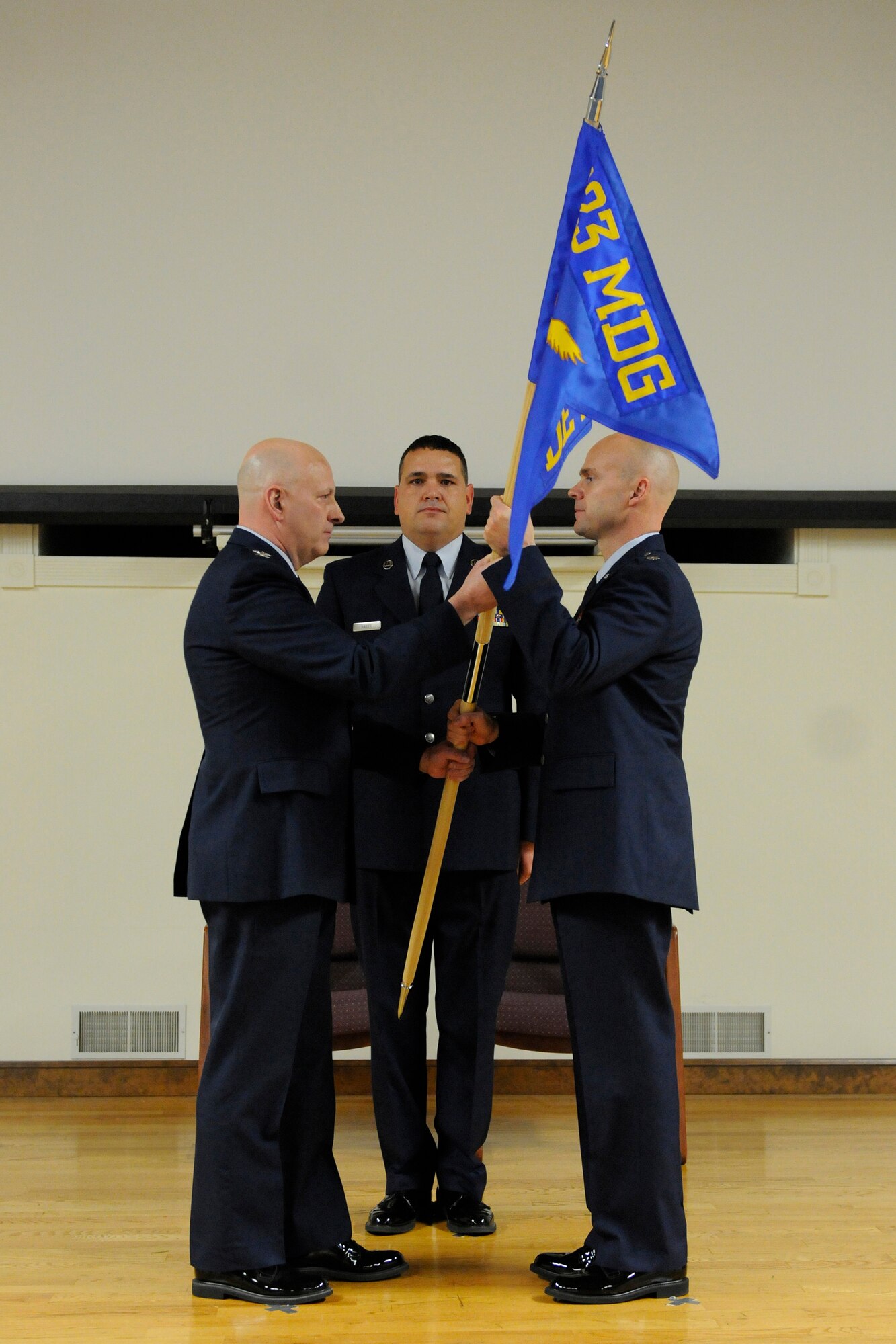 Lt. Col. Christopher Howell, right, assumes command of the newly formed 123rd Medical Group Detachment 1, CERFP by accepting the unit’s guidon from Col. Michael Cooper, commander of the 123rd Medical Group, during a ceremony at the Kentucky Air National Guard Base in Louisville, Ky., Jan. 9, 2016. The detachment is the medical component of a joint Kentucky National Guard disaster response team. (U.S. Air National Guard photo by Tech Sgt. Vicky Spesard)
