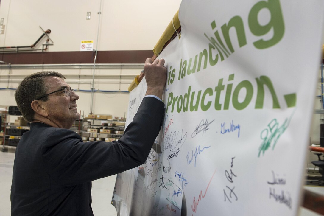 Defense Secretary Ash Carter signs the Boeing guest board in Seattle, March 3, 2016. Carter is in Seattle to strengthen ties between the Department of Defense and the tech community DoD photo by Navy Petty Officer 1st Class Tim D. Godbee