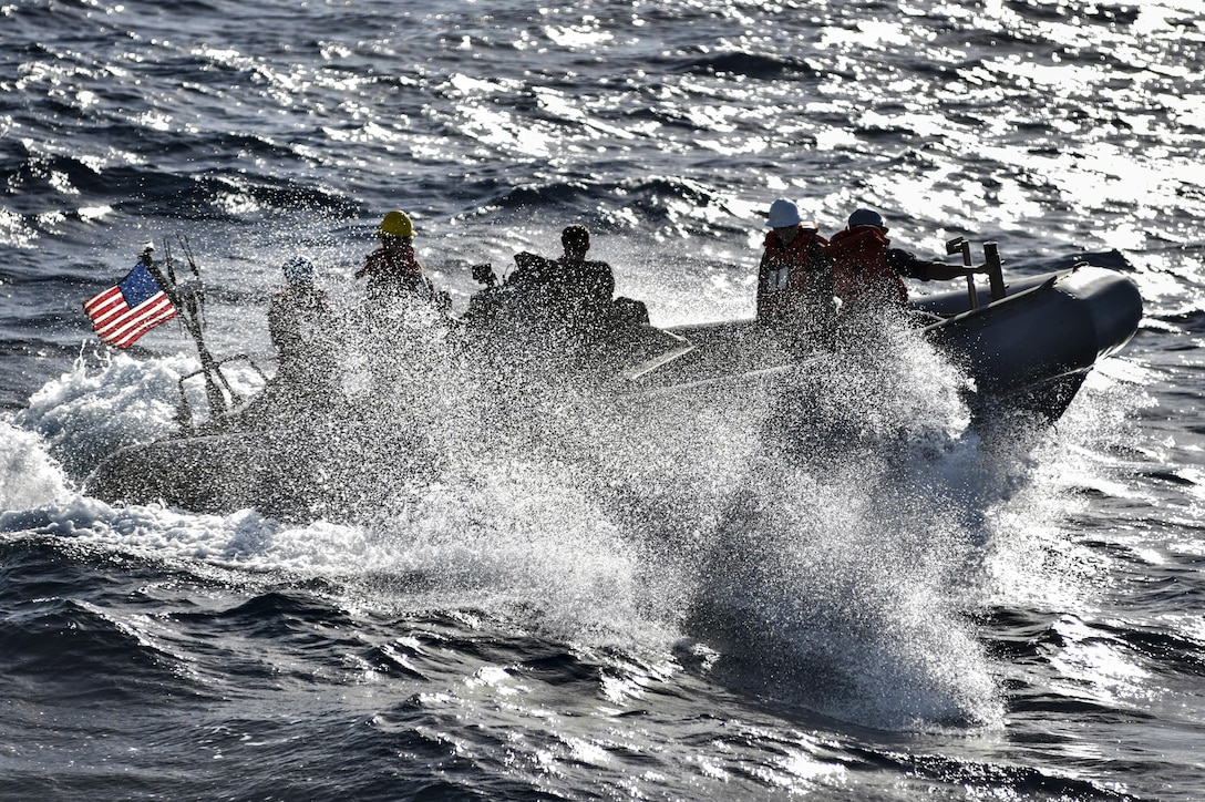 Sailors assigned to the USS Ross conduct small boat operations in the Mediterranean Sea, March 1, 2016. The guided-missile destroyer is patrolling in the U.S. 6th Fleet area of operations to support U.S. national security interests in Europe. Navy photo by Petty Officer 2nd Class Justin Stumberg
