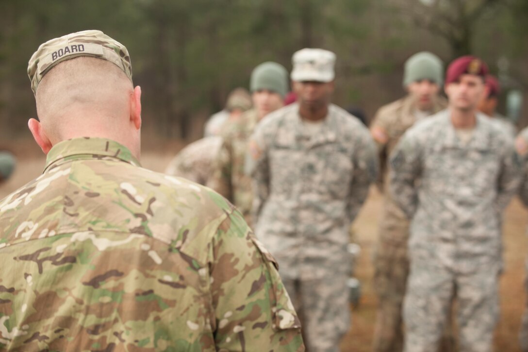 U.S. Army Jumpmaster briefs U.S. Army Paratroopers during an airborne operation at Fort Gordon, Ga., on March 4th, 2016. Operation Glück ab!, (OGA) is a bi-lateral airborne operation held at Fort Gordon, Ga., March 4, 2016. The purpose of OGA is to foster and nurture German and U.S. relationships, develop interoperability during training, and provide a basis for future operations in training and real world environments. The 982nd Combat Camera Company (Airborne), the 421st Quartermaster Company, and the United States Army Special Operations Command, Flight Company, Dwight D. Eisenhower Army Medical Center are providing support for OGA. (U.S. Army photo by Sgt. Jason A. Young / Released)