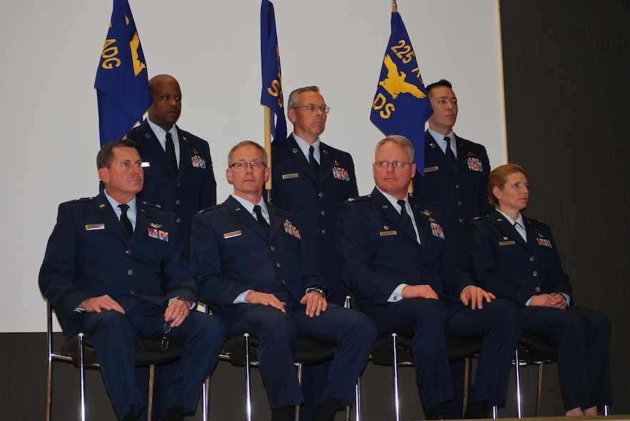 Western Air Defense Sector leaders gather during the activation and assumption of command ceremony, Joint Base Lewis-McChord, May 2, 2015. WADS is responsible for air sovereignty and counter-air operations over the western United States and directs a variety of assets to defend 2.2 million square miles of land and sea. (U.S. Air National Guard photo by 1st Lt. Colette D. Muller/Released)