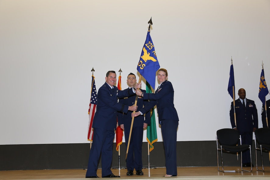 Western Air Defense Sector, Director of Support, Col. Paige T. Abbott, receives the 225th Air Defense Squadron guidon from Brig. Gen. John S. Tuohy, Washington state assistant adjutant general - Air, during the activation and assumption of command ceremony, Joint Base Lewis-McChord, May 2, 2015. WADS is responsible for air sovereignty and counter-air operations over the western United States and directs a variety of assets to defend 2.2 million square miles of land and sea. (U.S. Air National Guard photo by Capt. Kimberly Burke/Released)