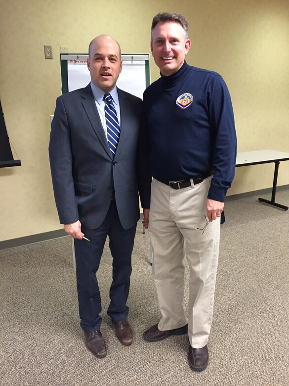 Col. Bernard Lindstrom, district commander, presents guest speaker, Jay Sukernek, Riverlife’s chief financial officer, with a commander’s coin in appreciation of Sukernek’s participation is the district’s senior leadership workshop, Feb. 19.