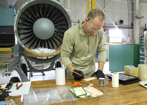 Tech. Sgt. Richard Coleman fills out an information tag will working oni a jet engine, March 5, 2016. Coleman is an aerospace propulsion specialist with the 127th Maintenance Squadron at Selfridge Air National Guard Base. (U.S. Air National Guard photo by Tech. Sgt. Dan Heaton)