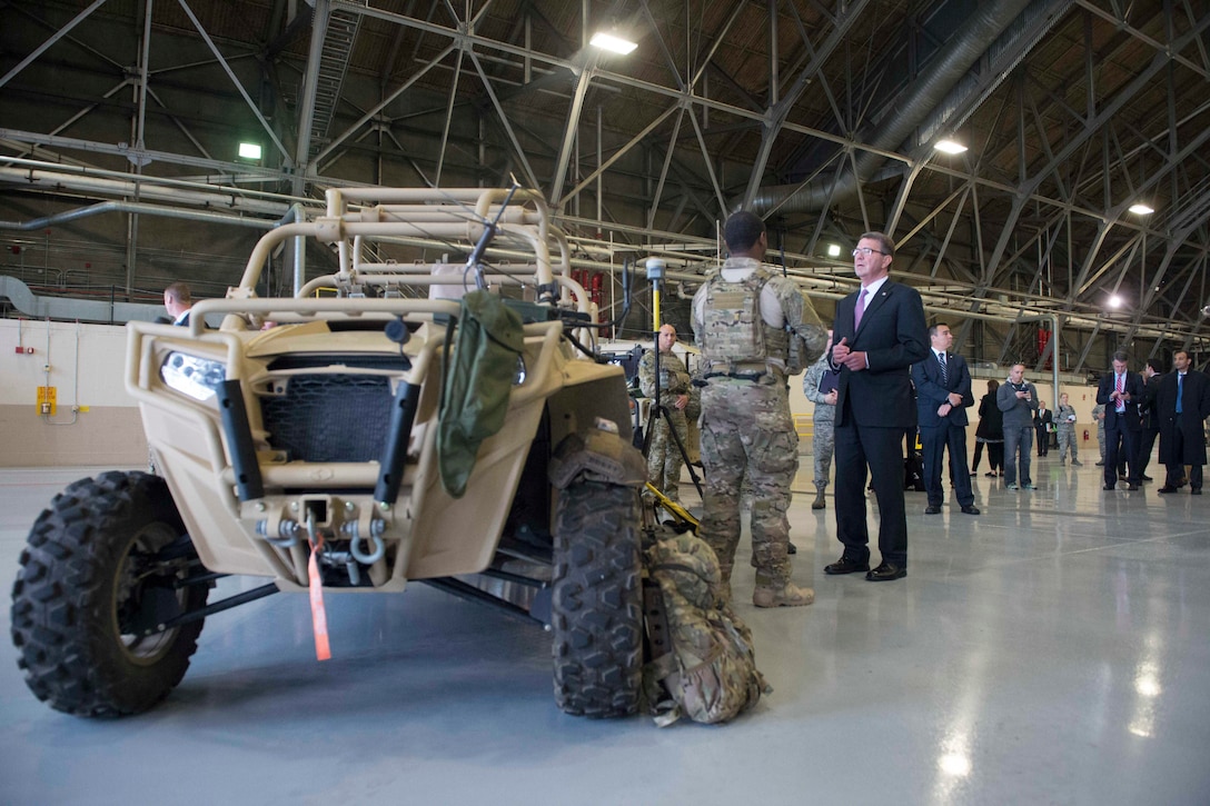Defense Secretary Ash Carter speaks with troops assigned to the 62nd Airlift Wing during a visit to Joint base Lewis-McChord, Wash., March 4, 2016. Carter said their posture and power projection capabilities play a pivotal role in DoD's rebalance to the Asia-Pacific. DoD photo by Navy Petty Officer 1st Class Tim D. Godbee  