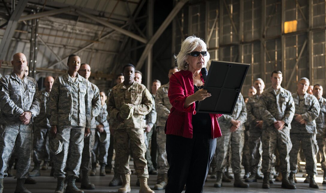 Commissioner Carolyn Ketchel, vice chairwoman for the Okaloosa County Commission, reads the Military Community Covenant before presenting a framed copy to the members of the 919th Special Operations Wing March 6 at Duke Field, Fla.  The community initiative is designed to sustain effective state and community partnerships as well as improve overall quality of life for Airmen and their families.  (U.S. Air Force photo/Tech. Sgt. Sam King)