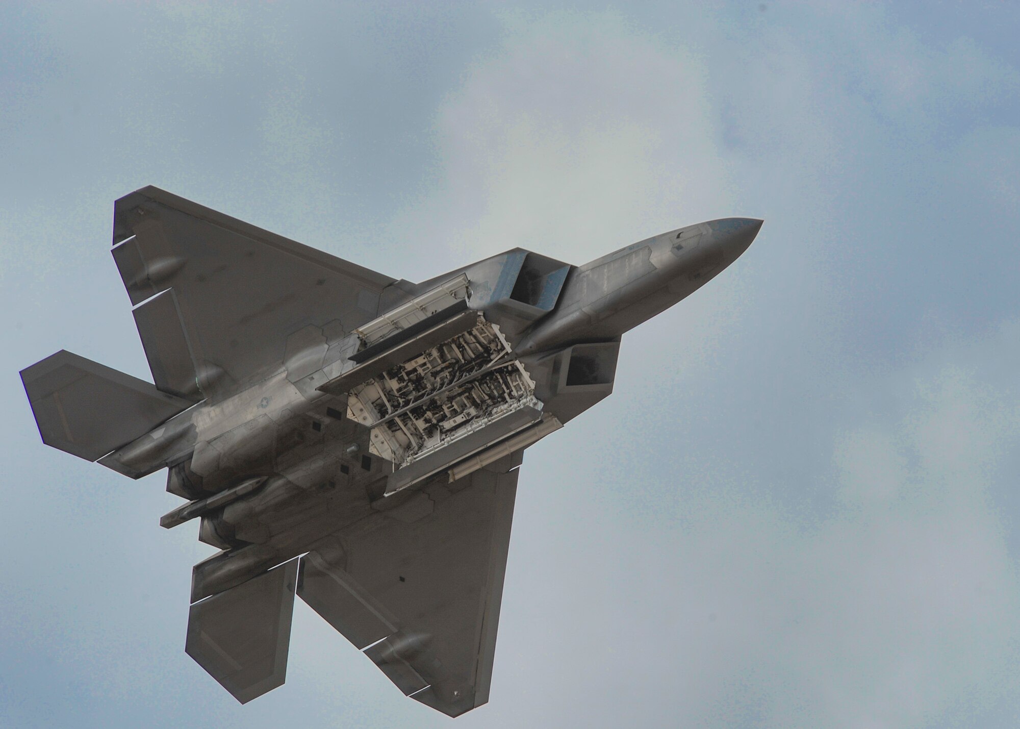 A U.S. Air Force F-22 Raptor shows weapons bay during the 2016 Heritage Flight Training and Certification Course at Davis-Monthan Air Force Base, Ariz., March 6, 2016. The Raptor performs both air-to-air and air-to-ground missions allowing full realization of operational concepts vital to the 21st century Air Force. (U.S. Air Force photo by Airman 1st Class Ashley N. Steffen/Released)