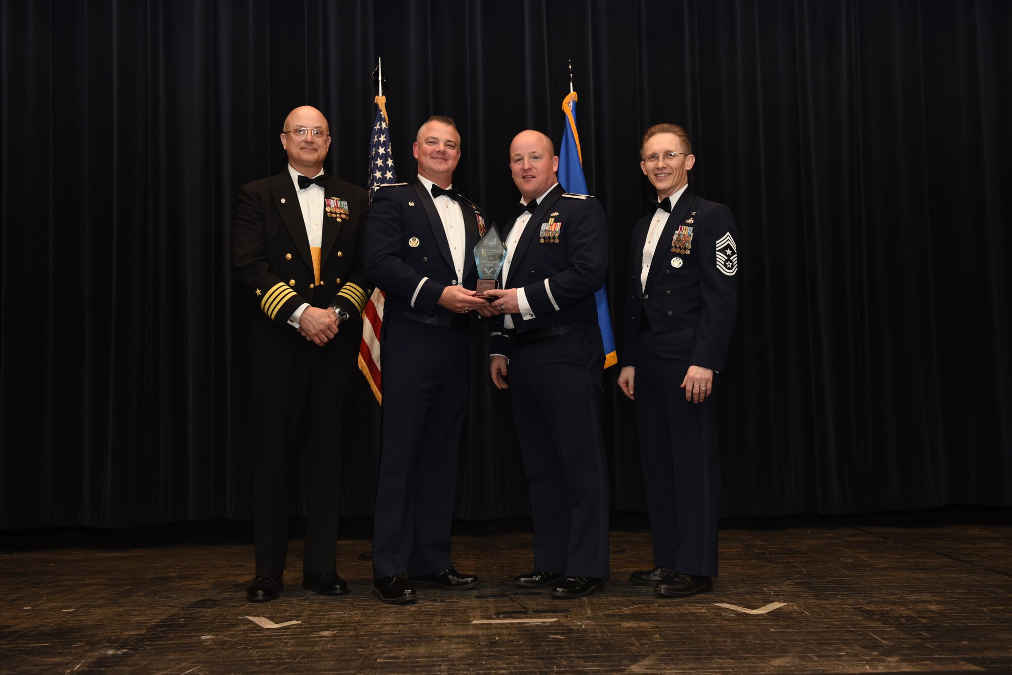 The 512th Airlift Wing hosted the 2016 Annual Awards Banquet at the Dover Downs Rollins Center in Dover, Del., March 5, 2016. The banquet, which was sponsored by the 512 AW Top 3, recognizes the achievements of high performing wing Airmen and civilians from throughout the year. (U.S. Air Force photo/1st Lt Steve Lewis)