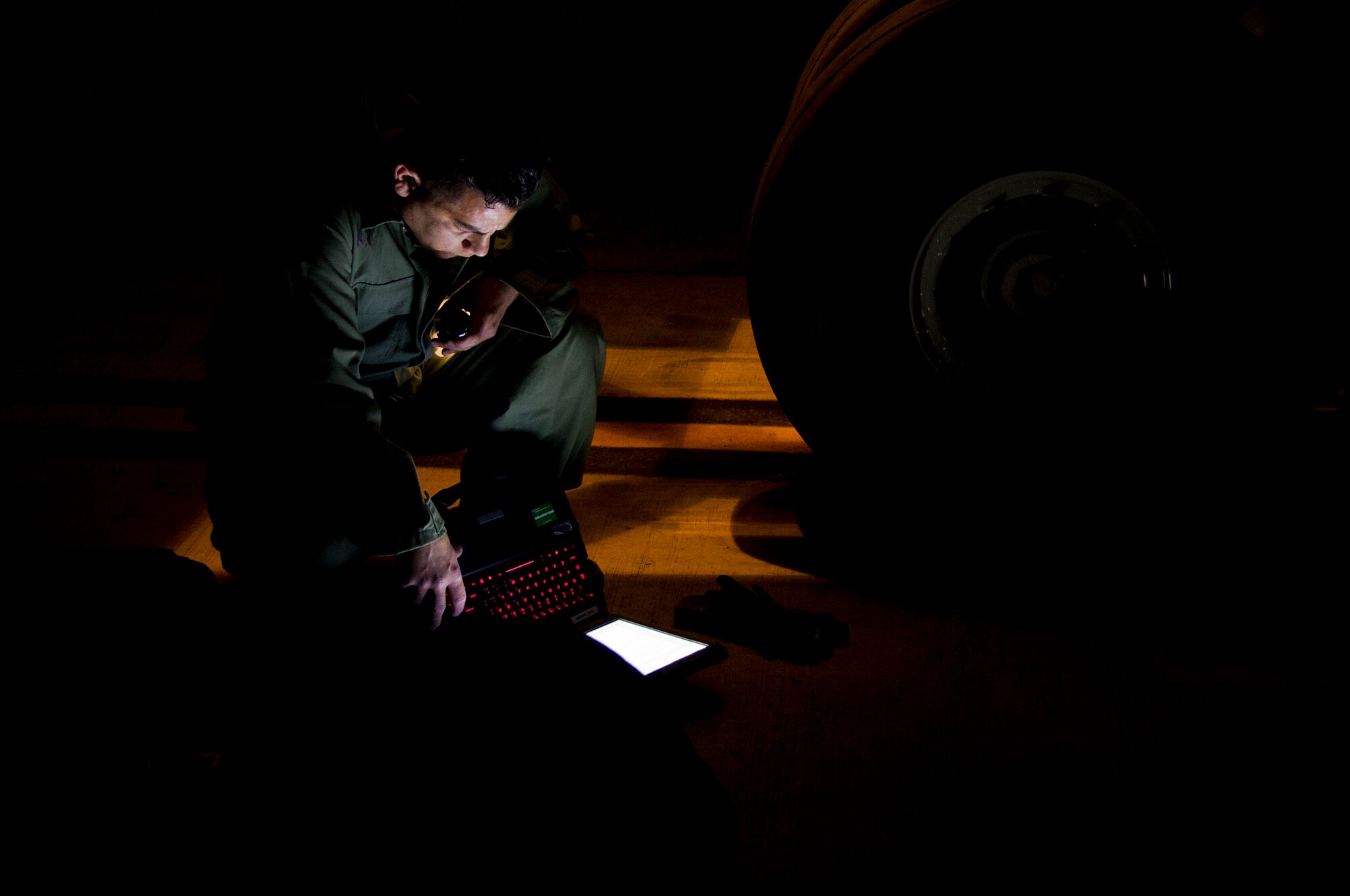 Senior Airman Lawrence Escobedo, 446th Aircraft Maintenance Squadron crew chief, prepares for an inspection of a C-17 Globemaster III aircraft February 23, 2016 at Naval Station Rota, Spain. The 446th AMXS crew chiefs performed nine of these basic post flight inspections during their annual tour. (U.S. Air Force Reserve photo by Staff Sgt. Madelyn McCullough)