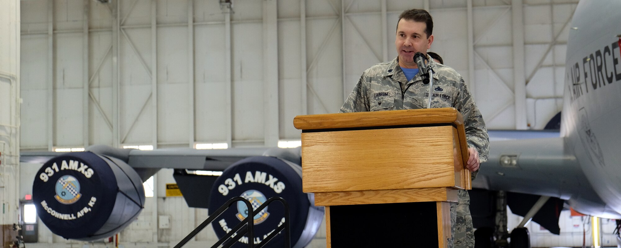 Lt. Col. Chris W. Labrum, 931st Air Refueling Wing deputy commander for maintenance, speaks during the 931 AMXS change of command ceremony March 6, 2016, McConnell Air Force Base, Kansas. This ceremony marks the first transfer of command since the 931st Air Refueling Wing was redesignated from a group to a wing. (U.S. Air Force photo by Senior Airman Preston Webb)