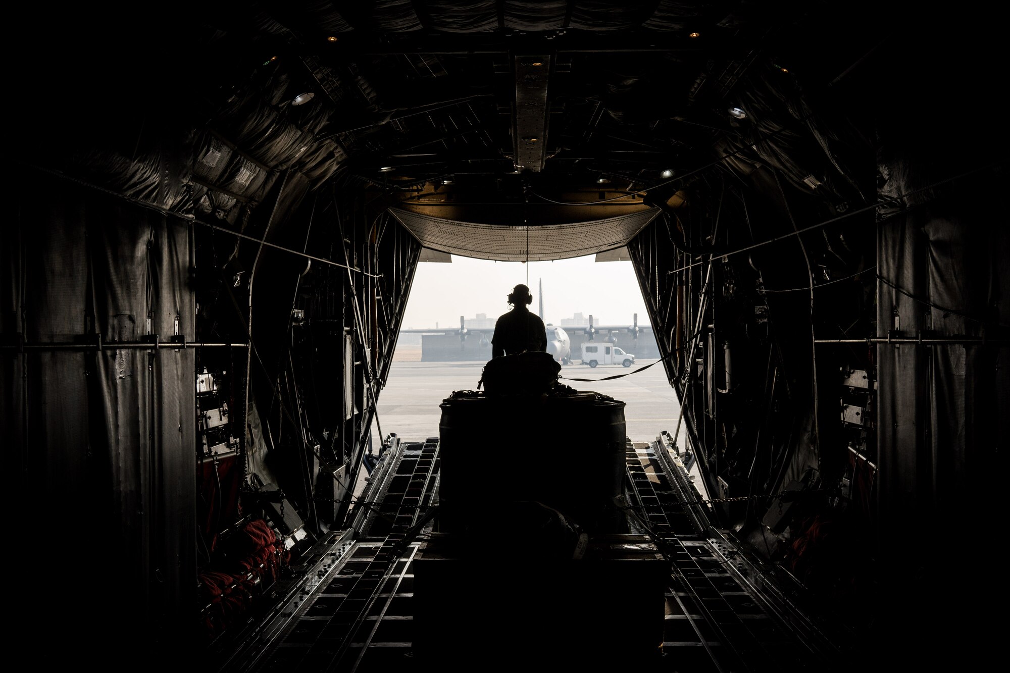 Master Sgt. Richard LaFrance, 36th Airlift Squadron loadmaster, performs a preflight inspection on a C-130 Hercules at Yokota Air Base, Japan, March 4, 2016. Loadmasters are responsible for ensuring that aircraft cargo and passengers are transported safely and in a timely manner, which involves preparing rigging inside the aircraft and performing checks before and during the flight.  (U.S. Air Force photo by Staff Sgt. Michael Smith/Released)   