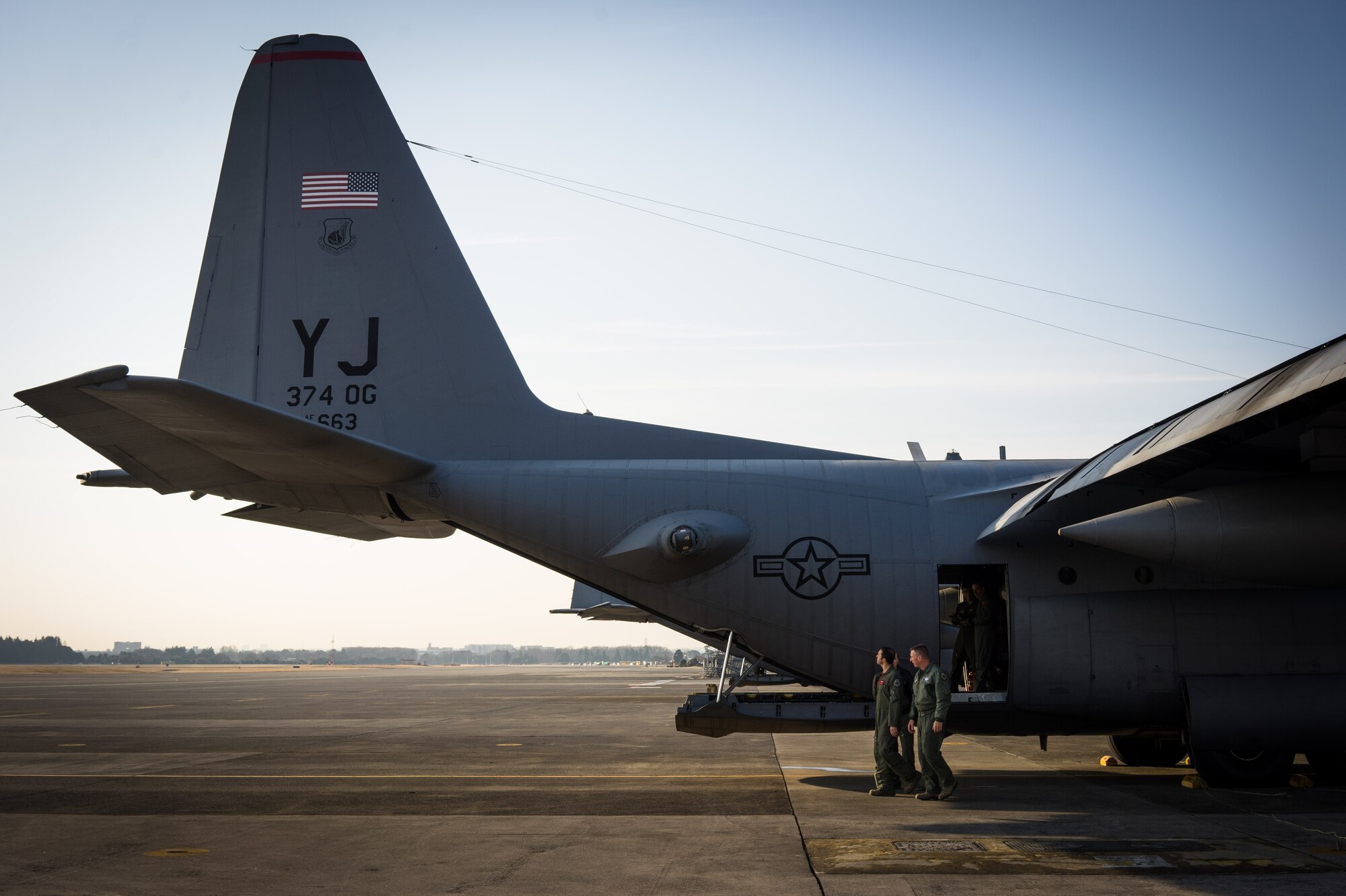 Capt. Erol Kelter, 36th Airlift Squadron C-130 Hercules pilot, performs a preflight inspection with Lt. Gen. John Dolan, U.S. Forces, Japan and 5th Air Force commander, on the flightline at Yokota Air Base, Japan, March 4, 2016. This was Dolan’s first time flying with the 36th Airlift Squadron as they conduct their training missions to remain proficient to support any contingency.  (U.S. Air Force photo by Staff Sgt. Michael Smith/Released)   