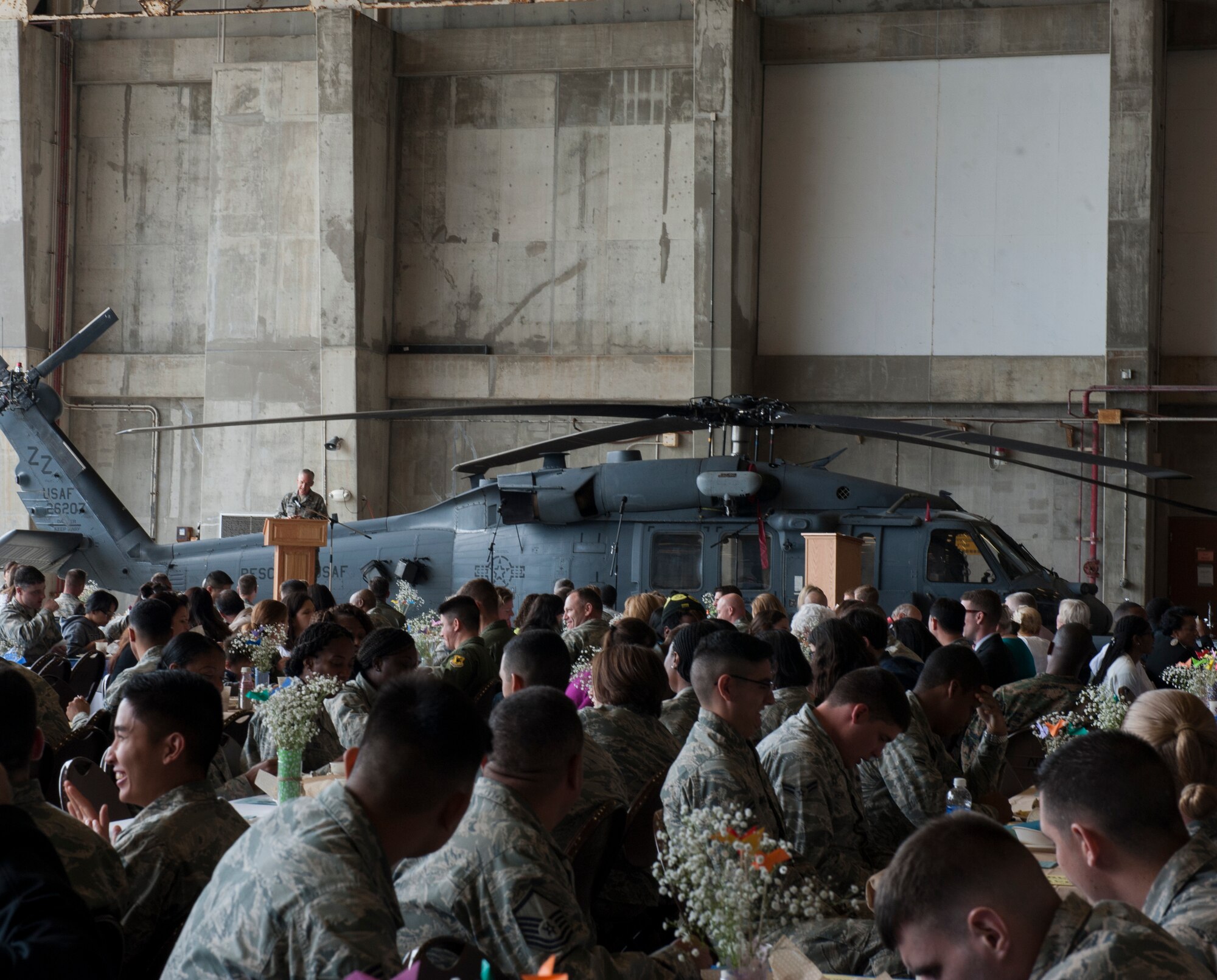 U.S. Air Force Col. Steven McCain, Pacific Air Forces command chaplain, delivers a speech during an annual National Prayer Luncheon, March 2, 2016, at Kadena Air Base, Japan. McCain encouraged audience members to consider their own spirituality and promote wingmanship with each other. (U.S. Air Force photo by Airman 1st Class Lynette M. Rolen)