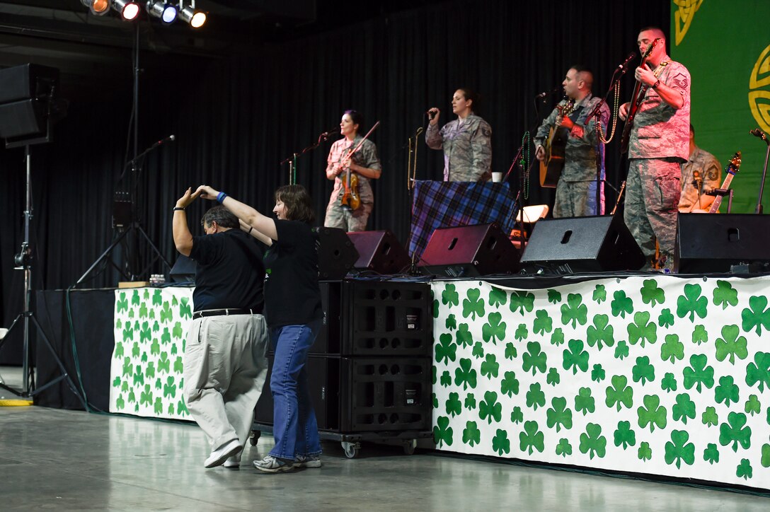 North Texas Irish Festival attendees dance during a performance by the U.S. Air Force’s Celtic Aire in Dallas, Texas, March 5, 2016. This year’s festival was themed “Legends and Legacy” to highlight some of the true legends of Irish music as well as emerging musicians. (U.S. Air Force photo/Senior Airman Ryan J. Sonnier/RELEASED)