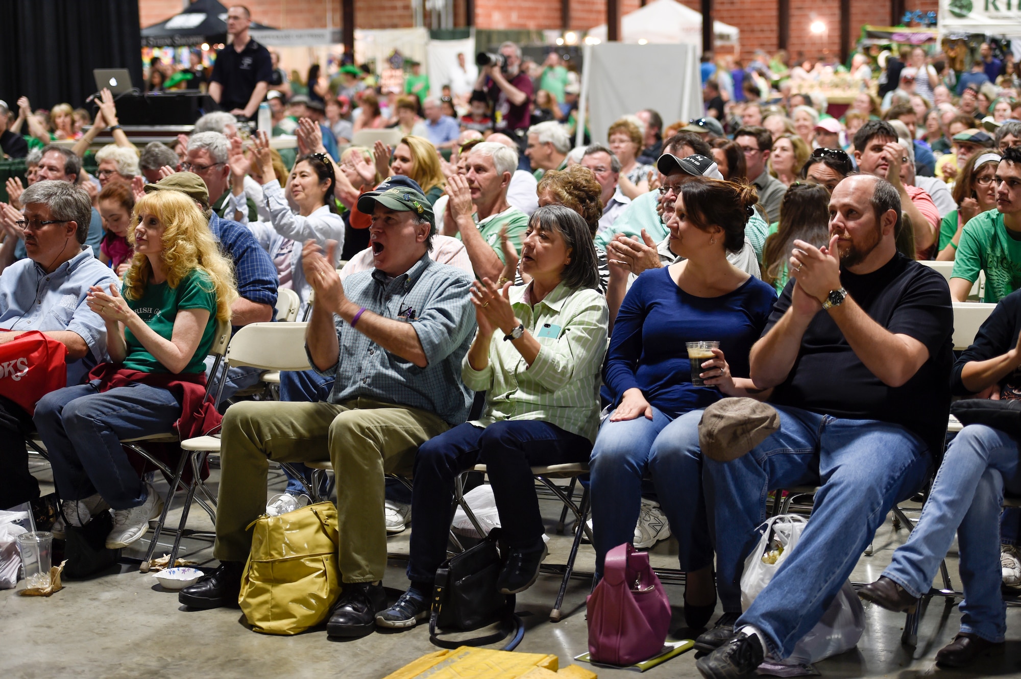 A crowd cheers during a performance by the U.S. Air Force’s Celtic Aire at the North Texas Irish Festival in Dallas, Texas, March 5, 2016. This year’s festival was themed “Legends and Legacy” to highlight some of the true legends of Irish music as well as emerging musicians. (U.S. Air Force photo/Senior Airman Ryan J. Sonnier/RELEASED)