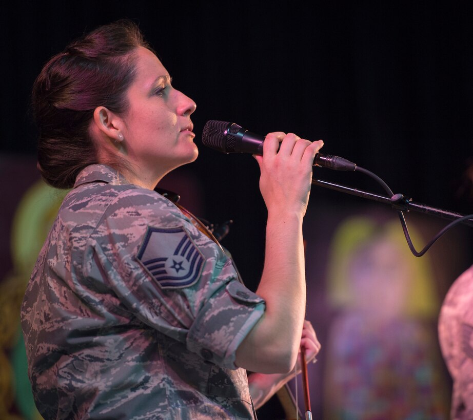 Master Sgt. Emily Wellington, U.S. Air Force’s Celtic Air violinist and vocalist, sings an Irish song during the North Texas Irish Festival in Dallas, Texas, March 4, 2016. This year’s festival was themed “Legends and Legacy” to highlight some of the true legends of Irish music as well as emerging musicians. (U.S. Air Force photo/Senior Airman Ryan J. Sonnier/RELEASED)