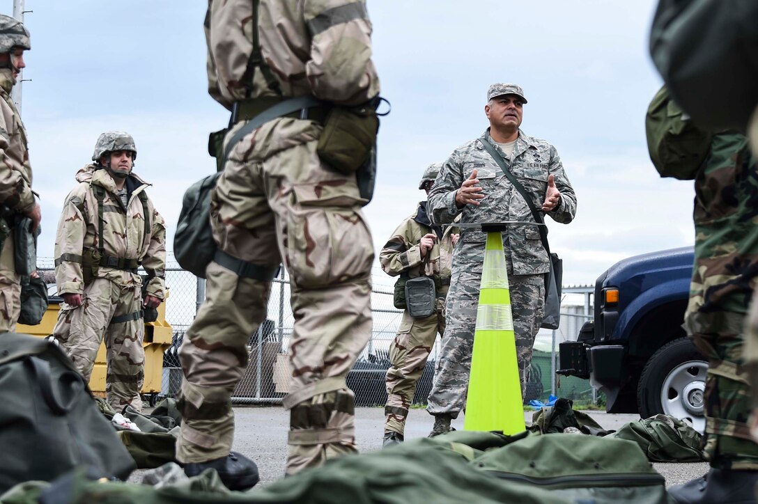 U.S. Air Force Chief Master Sgt. Benjamin Torres, 144th Civil Engineer Squadron emergency manager, conducts the chemical, biological, radiological, and nuclear training portion of the expeditionary skills course held at the Fresno Air National Guard Base March 5, 2016.  The ESC included training in both CBRN and self-aid and buddy care. (U.S. Air National Guard photo by Senior Airman Klynne Pearl Serrano)