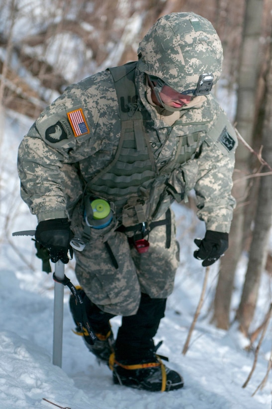 A soldier traverses a mountain at Smuggler's Notch in Jeffersonville, Vt., March 5, 2016. Vermont Army National Guard photo by Spc. Avery Cunningham