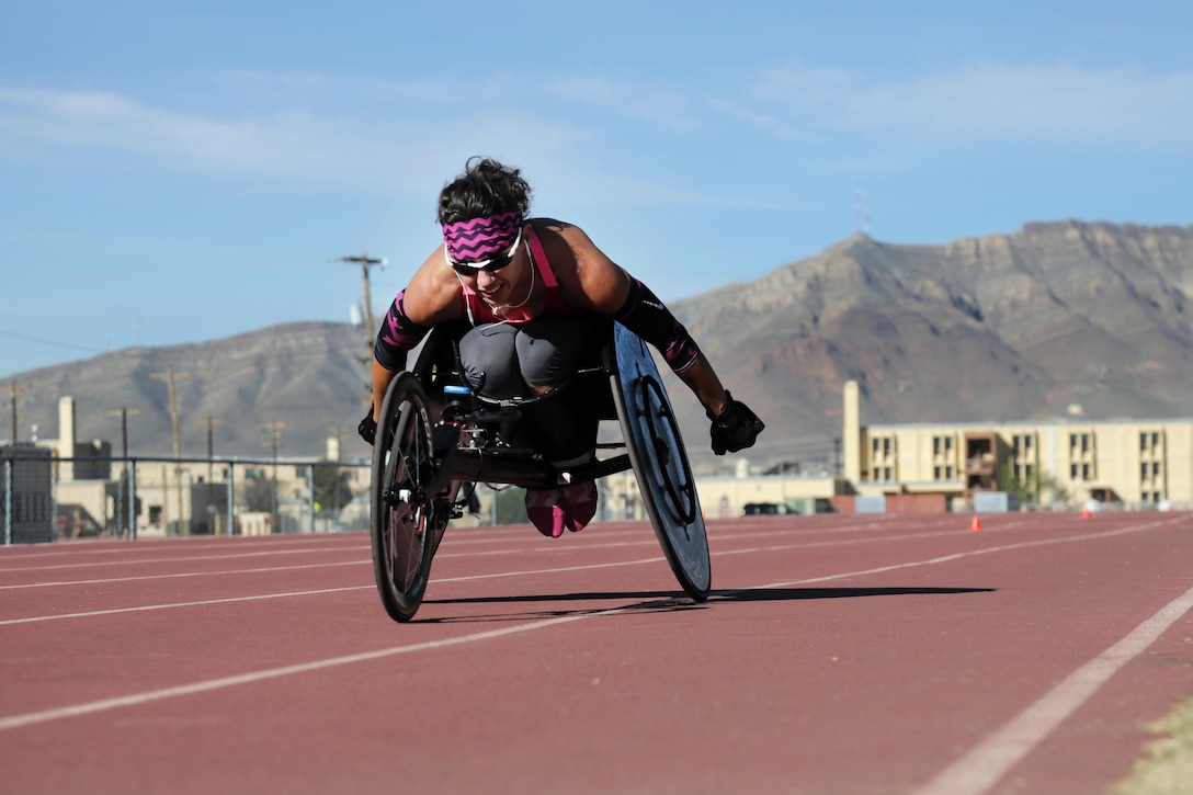 Army Cpt. Kelly Elmlinger participates in the wheelchair bikes trials at Soto track on Fort Bliss, Texas., March 1, 2016. More than 100 wounded, ill and injured soldiers and veterans are at Fort Bliss to train and compete in a series of athletic events during the Army Trials. The Army Trials, held March 6-10, are conducted by the Department of Defense Warrior Games 2016 Army Team. Approximately 250 athletes, representing teams from the Army, Marine Corps, Navy, Air Force, Special Operations Command and the British Armed Forces will compete in the DoD Warrior Games June 14-22 at the U.S. Military Academy, West Point, N.Y. Army photo by Spc. Audrequez Evans