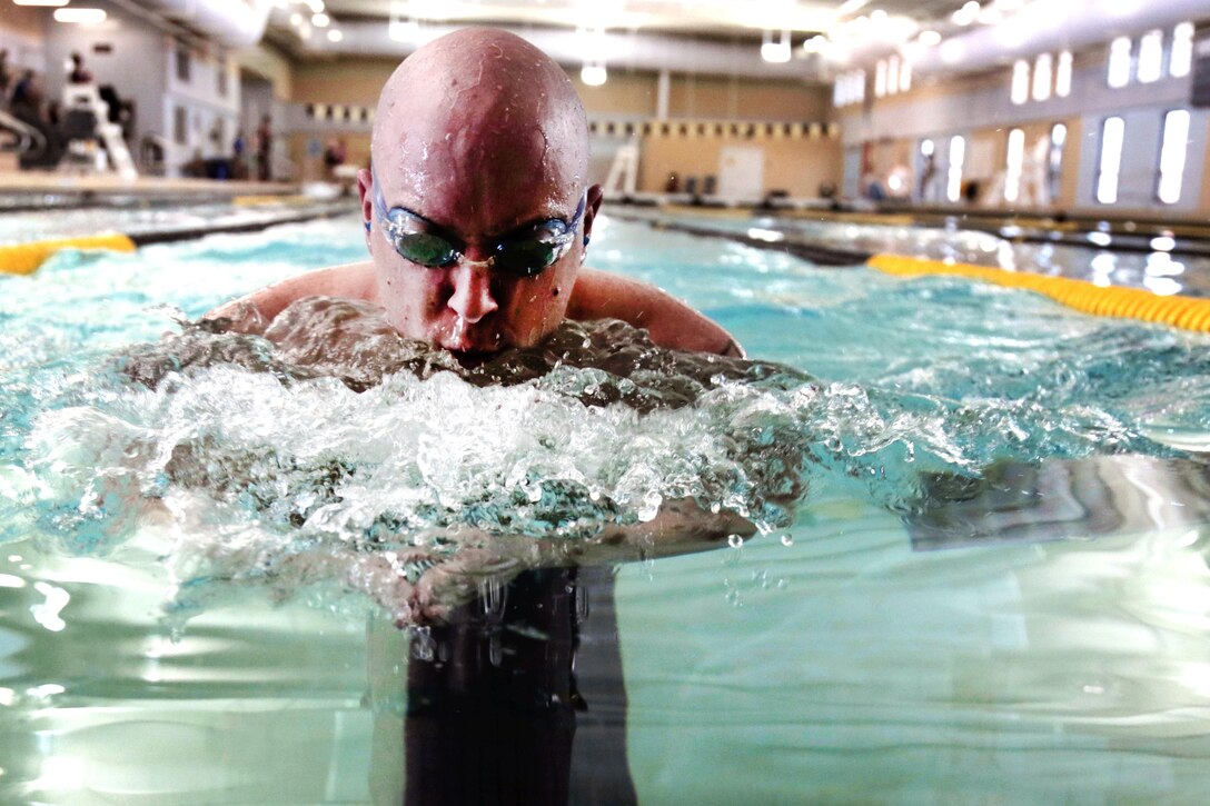 Army Sgt. David Jones practices his swimming technique at the Aquatics Training Center during the Army Trials on Fort Bliss, Texas, March 1, 2016. Army photo by Pfc. Ian Ryan