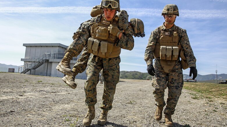 Marines execute a casualty evacuation drill during combat marksmanship training at Marine Corps Base Camp Pendleton March 2, 2016. The training was part of the Urban Leaders Course taught by 1st Marine Division Schools. The course focuses on enhancing small unit leadership through integrated training and implementation of fire teams and squad-sized elements in an urban setting. Marines participating in the training are from various units on Camp Pendleton.