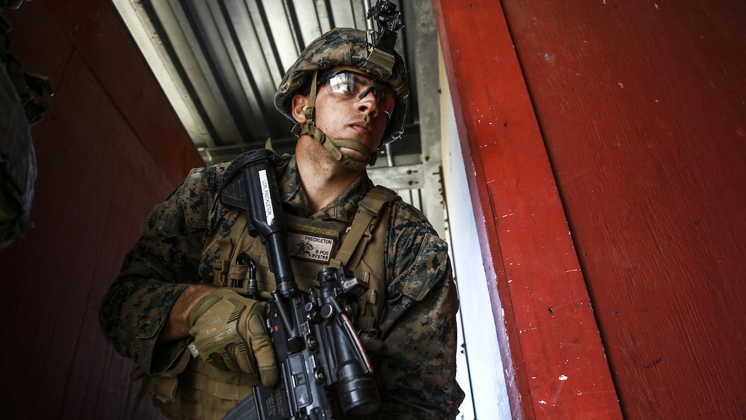 Lance Cpl. Roger Freckleton gets into position as the point man for his fire team during combat marksmanship training at Marine Corps Base Camp Pendleton March 2, 2016. The training was part of the Urban Leaders Course taught by 1st Marine Division Schools. The course focuses on enhancing small unit leadership through integrated training and implementation of fire teams and squad-sized elements in an urban setting. Freckleton is a scout rifleman with 1st Light Armored Reconnaissance Battalion, 1st Mar. Div., and a St. Augustine, Florida, native.
