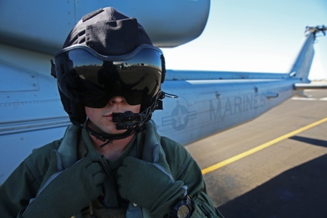 Lance Cpl. Gerald J. Demontmollin III stands in front of a UH-1Y Venom aircraft Feb. 24, 2016, at Marine Corps Base Camp Pendleton, Calif. Demontmollin and his squadron performed simulated assault and close air support training to maintain unit readiness. Demontmollin, from Grass Valley, is a crew chief with Marine Light Attack Helicopter Squadron 169, Marine Aircraft Group 39, 3rd Marine Air Wing. 