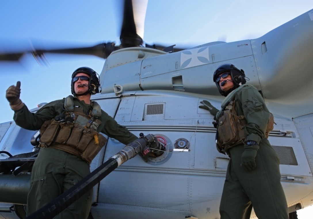 Staff Sgt. Samuel J. Galan Jr. and Lance Cpl. Gerald J. Demontmollin III refuel a UH-1Y Venom Feb. 24, 2016, at Marine Corps Base Camp Pendleton, Calif. Demontmollin and his squadron performed simulated assault and close air support training to maintain unit readiness. “We can shut the aircraft down and turn the engines off [and then fuel the aircraft]. That’s called cold refueling. What we did today was hot refueling. We can leave the aircraft running while we fuel, getting us ready to get back in the fight,” said 1st Lt. David W. Few, a UH-1Y Venom copilot with Marine Light Attack Helicopter Squadron 169, Marine Aircraft Group 39, 3rd Marine Air Wing. Galan, a native of Houston, Texas, is a crew chief with HMLA-169. Demontmollin, from Grass Valley is a crew chief with HMLA-169. 