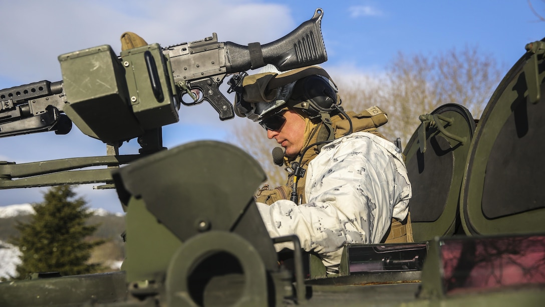 1st Lt. Grant McCloskey, a Light Armored Reconnaissance platoon commander with Black Sea Rotational Force, plans the next reconnaissance mission during Exercise Cold Response 16 near Namsos, Norway, March 4, 2016. The exercise is a Norwegian invitational previously-scheduled exercise that involves approximately 16,000 troops from 13 NATO and partner countries.