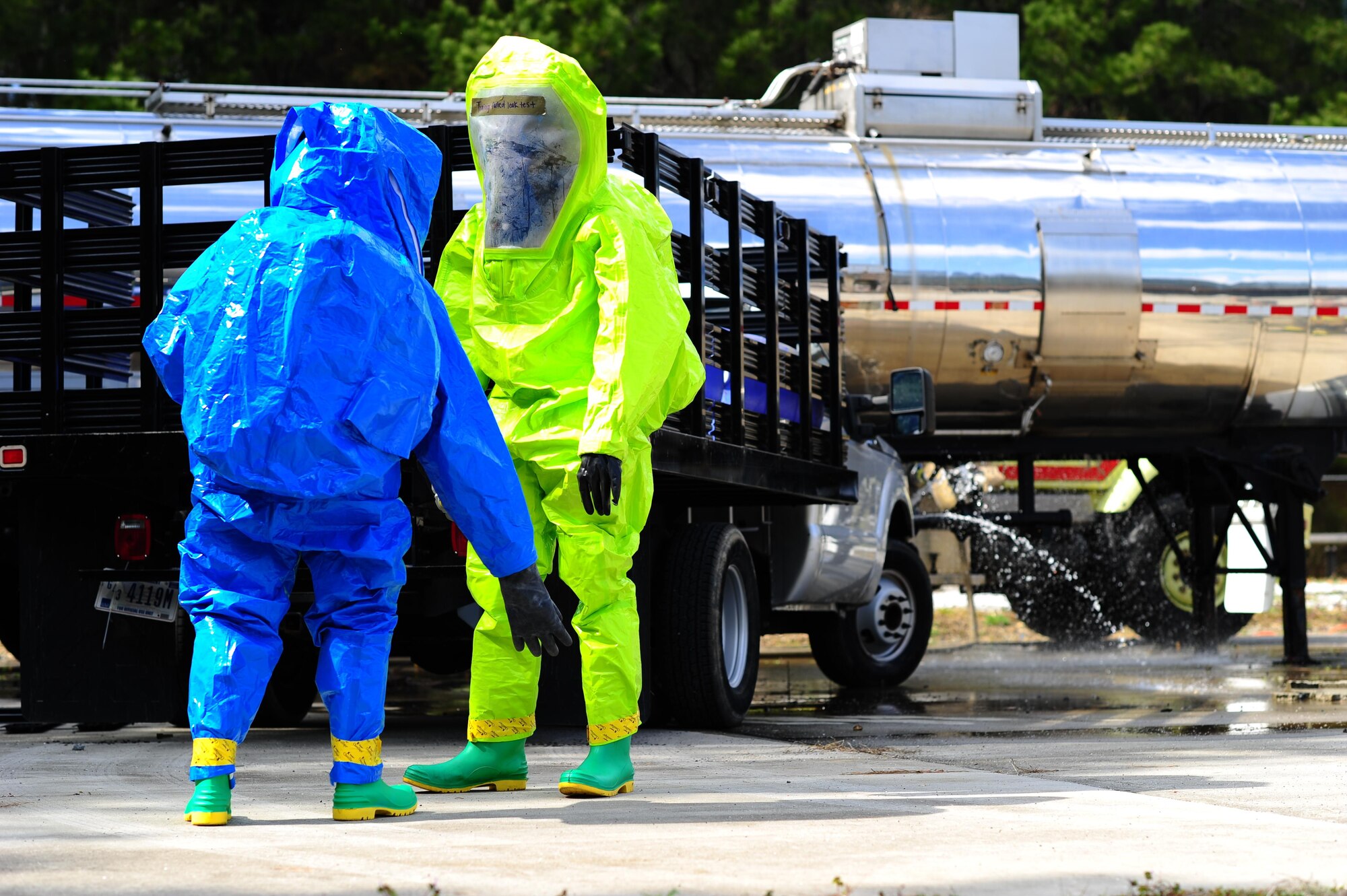 Airmen from the 315th Civil Engineering Flight conduct an exercise at their training facility at Joint Base Charleston, S.C., March 5, 2016. Members faced a scenario that required the cooperation between their firefighters, emergency management and explosive ordinance device units in order to develop a safe solution, while properly using their safety equipment. (U.S. Air Force photo by Senior Airman Jonathan Lane)