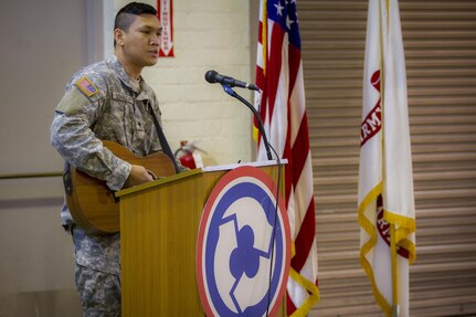 Spc. Daniel Sidabutar leads Soldiers in song during the 311th Sustainment Command (Expeditionary) worship service at their Battle Assembly March 6, 2016. Sidabutar works Tech Support in the G6 section and said, "I also want to use my use my musical talents to serve God as well as my fellow Soldiers." Los Angeles.