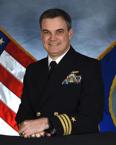 Cmdr. Beck grew up in Midland, Texas and graduated from the U.S. Naval Academy in 1992 with a degree in computer science. His first tour of duty was on USS GUNSTON HALL (LSD 44) from January 1993 to March 1996, where he served as Electrical Officer, Combat Information Center Officer, and Assistant Operations Officer. He qualified OOD, SWO, CDO, TAO, and EOOW. CDR Beck’s second division officer tour was aboard USS LABOON (DDG 58) from March 1996 to October 1997. He served as the A, E, and R Division Officer and as Assistant Engineer.